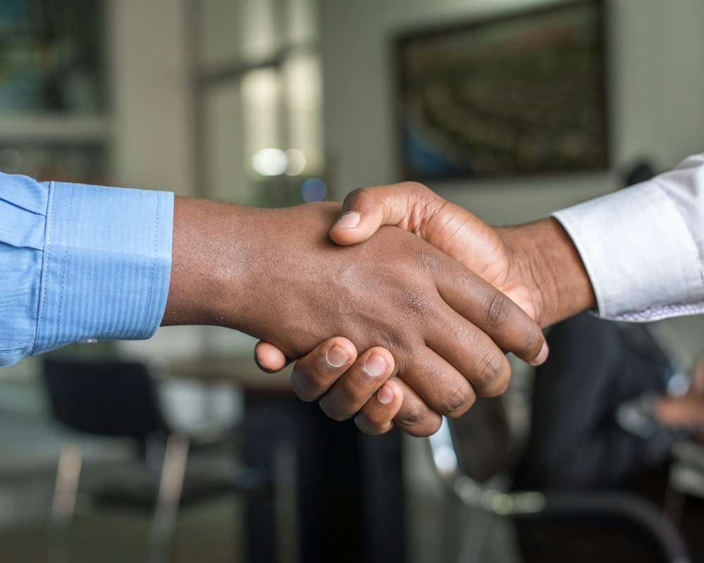 Handshake confirming a new business partnership in Dubai